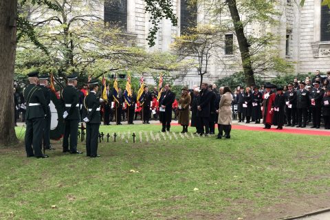 The Master places a cross in the Garden of Remembrance at St Paul's Cathedral